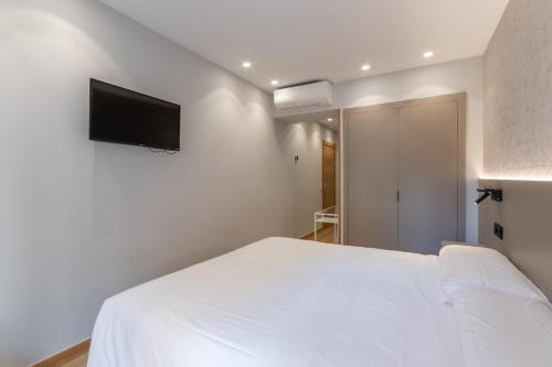 Foto de una habitación de EightRooms La Rioja Pension