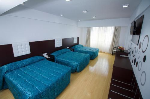 Foto de una habitación de Hotel Regina