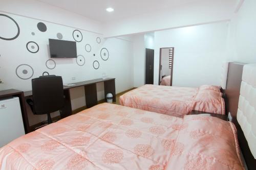 Foto de una habitación de Hotel Regina