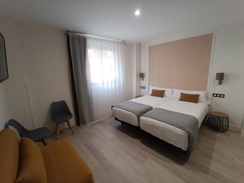 Foto de una habitación de Hotel Rural Envero