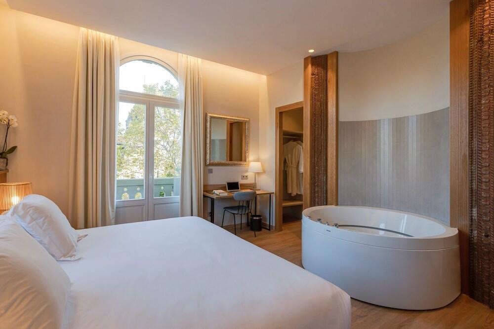 Foto de una habitación de Hotel Boutique Mirlo Barcelona