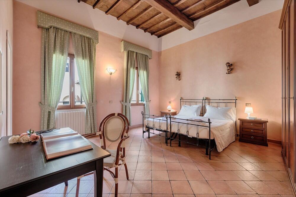 Foto de una habitación de Apartamentos Central Strozzi