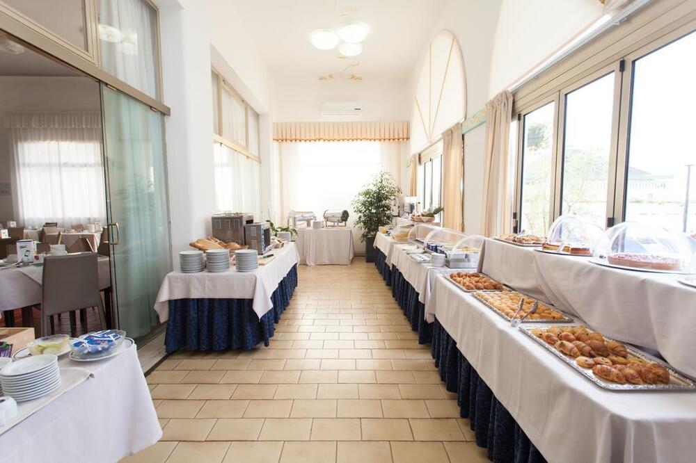 Foto de restauración de Hotel Marina