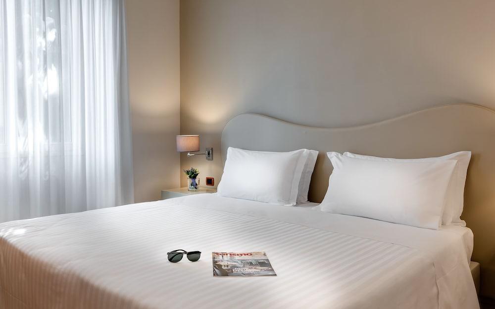 Foto de una habitación de Hotel La Fortezza