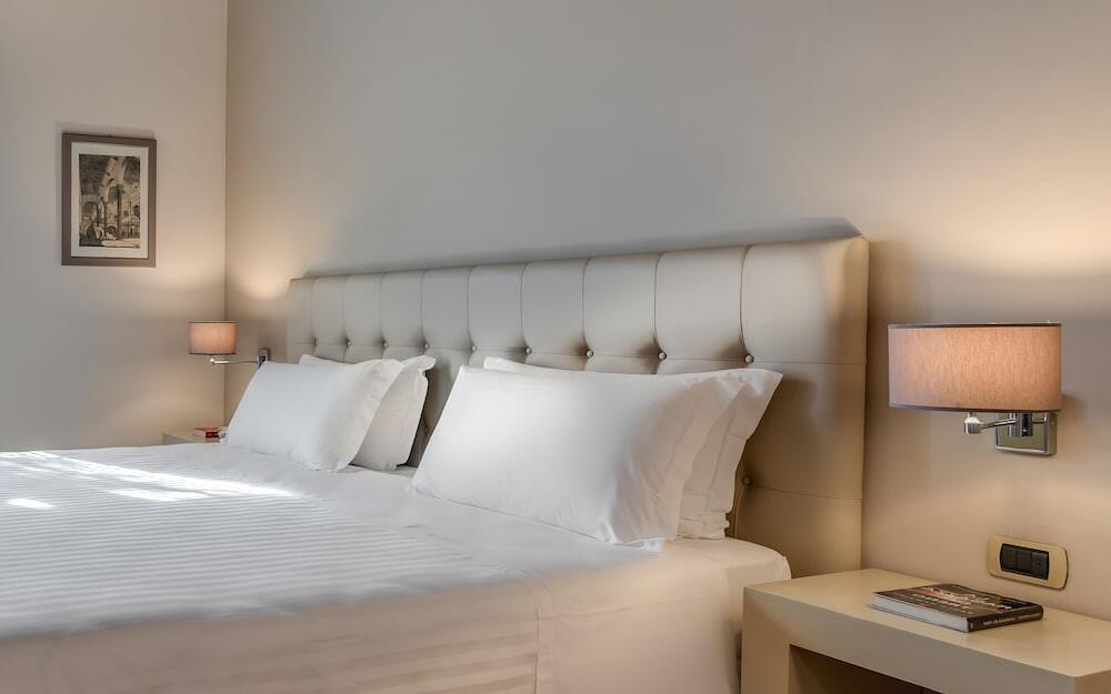Foto de una habitación de Hotel La Fortezza