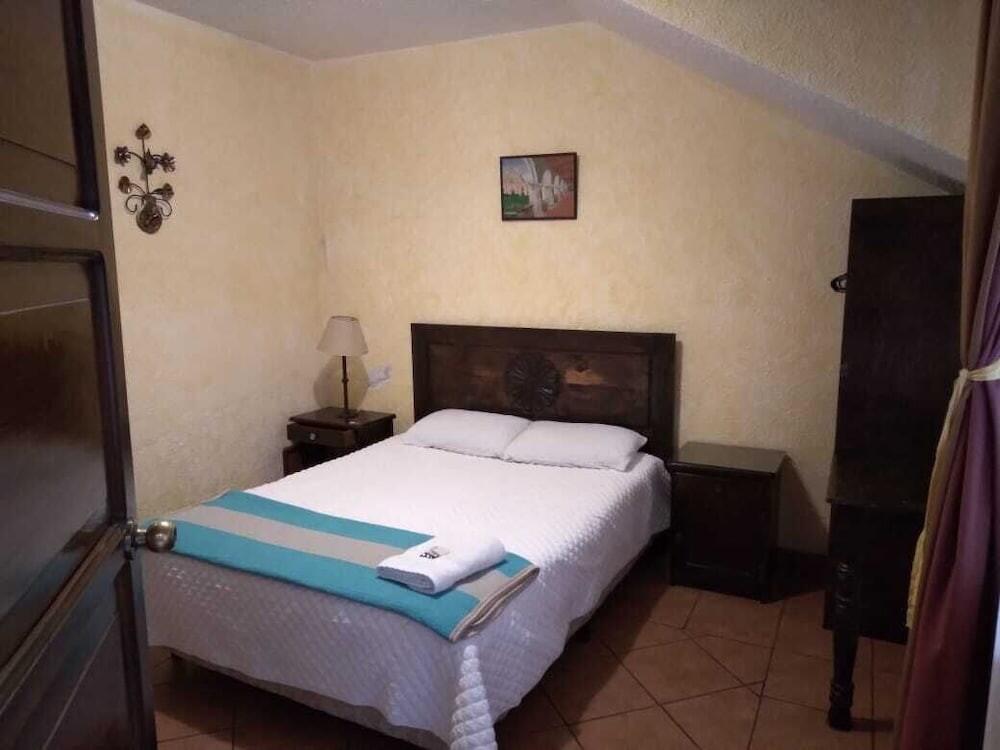 Foto de una habitación de Hotel Posada Don Valentino