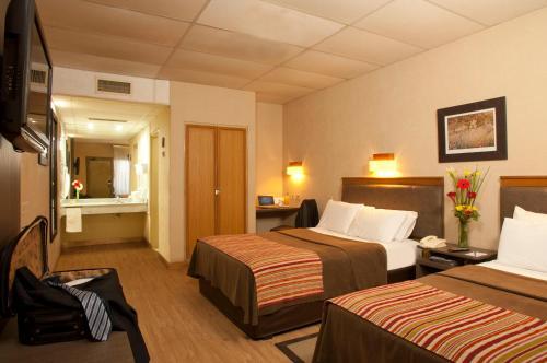 Foto de una habitación de Hotel Land Express Neuquén