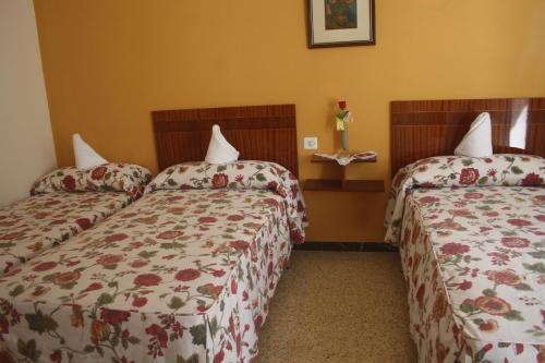 Foto de una habitación de Hostal Torre Mar