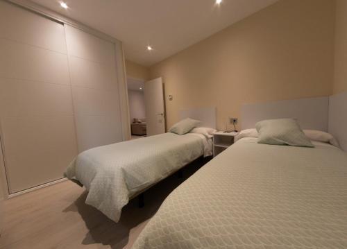 Foto de una habitación de Apartamentos Turisticos - Palacio de Yolanda