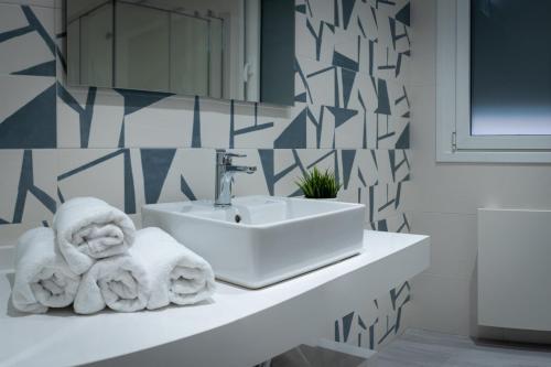 Foto del baño de Apartamentos Turisticos - Palacio de Yolanda