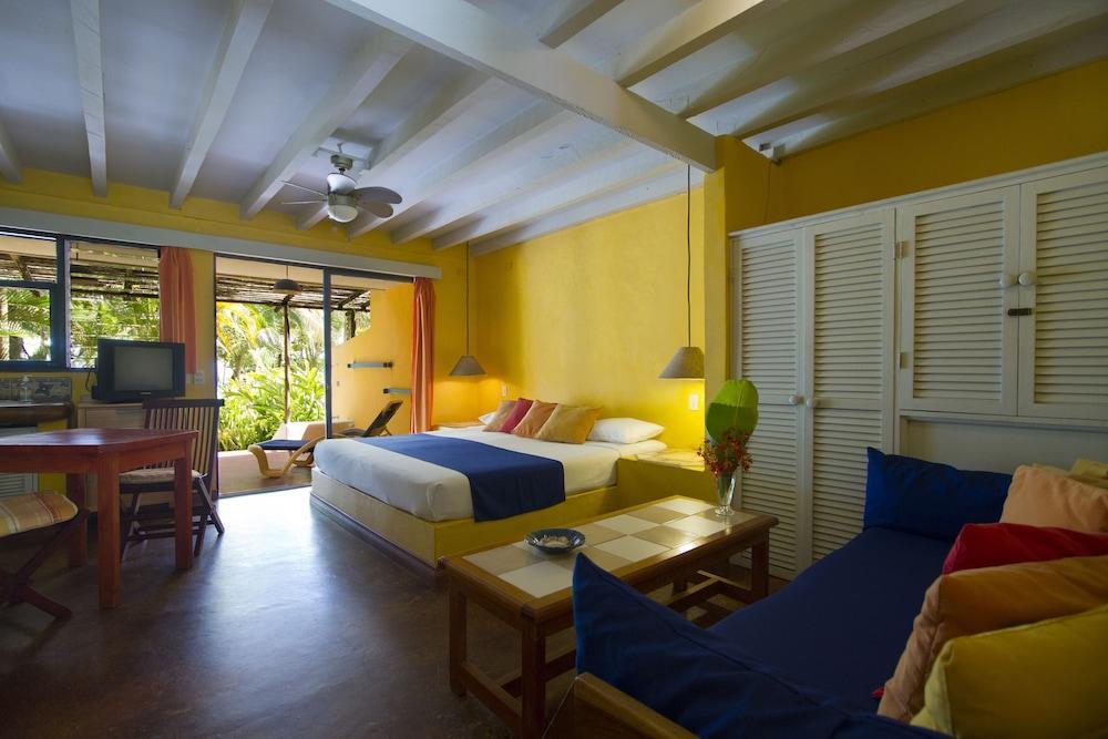 Foto de una habitación de Villas del Caribe