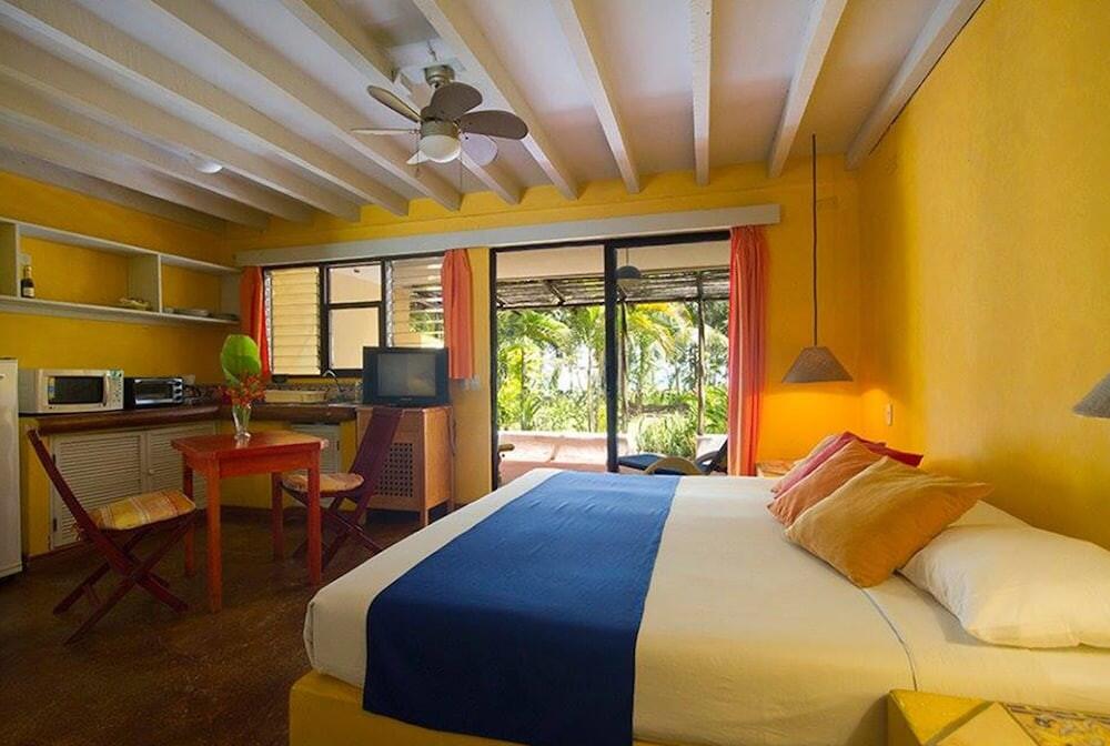 Foto de una habitación de Villas del Caribe