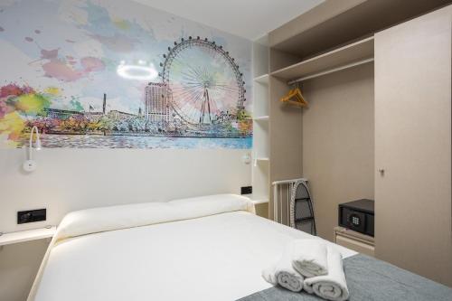 Foto de una habitación de Apartamentos MUNDOBOOKING Centro Levante