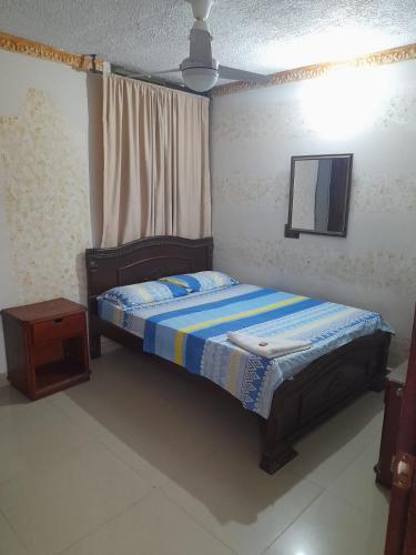 Foto de una habitación de Hotel Colonial Inn