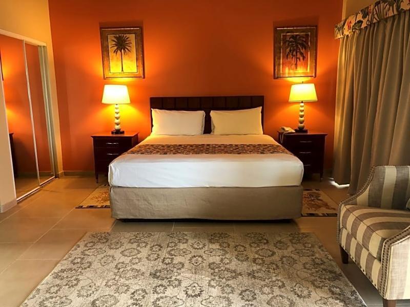 Foto de una habitación de Carl&amp;#039;s Unique Inn &amp;amp; Conference Facilities