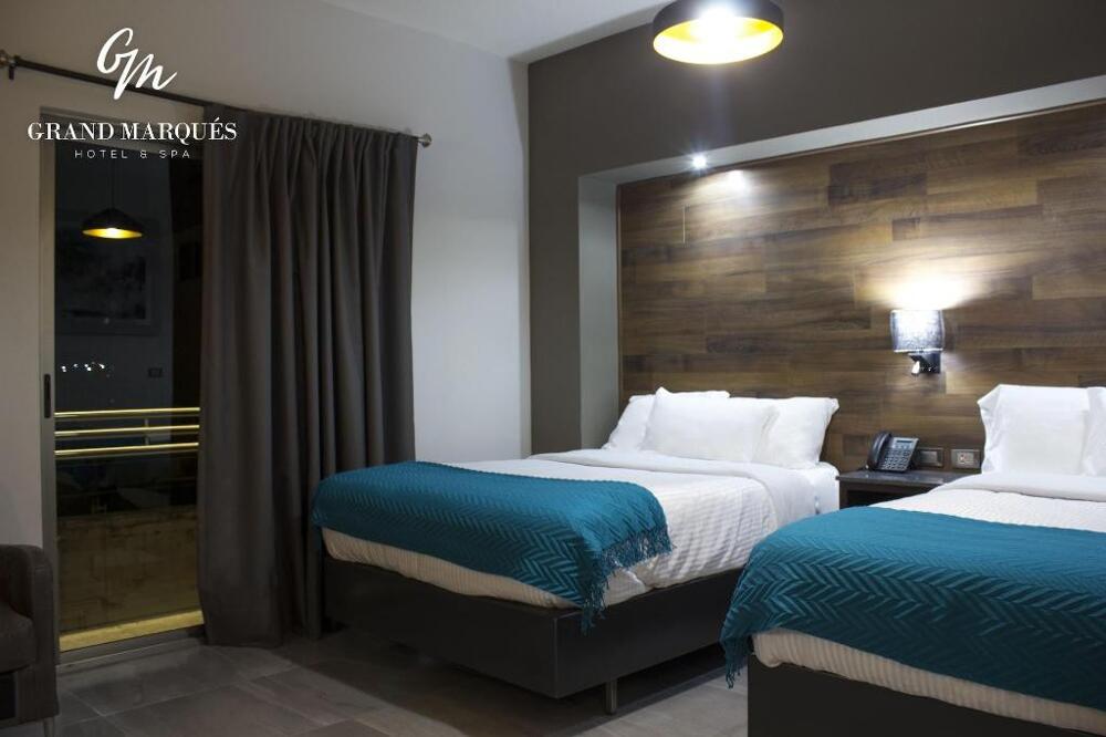 Foto de una habitación de Hotel Grand Marques