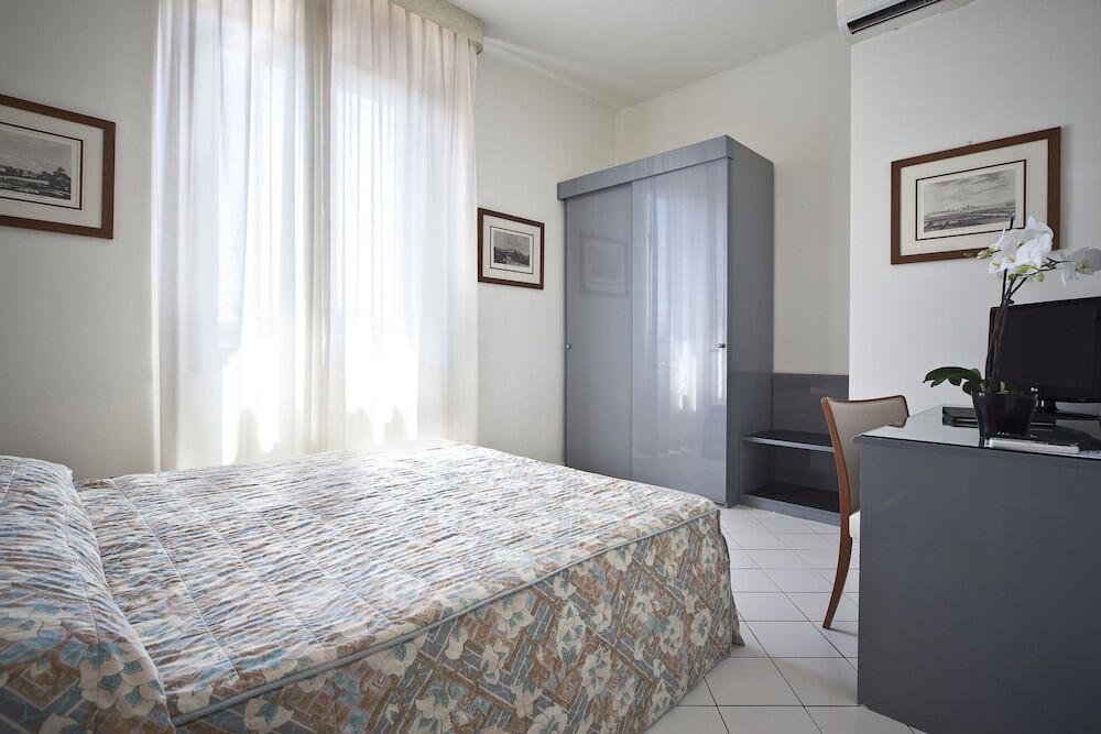 Foto de una habitación de Hotel Italia