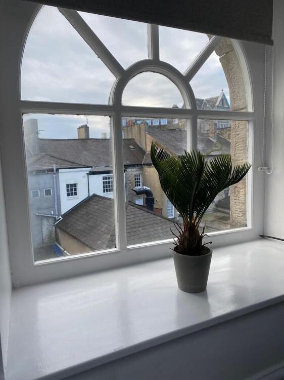 Foto de una habitación de Sun Street ApartHotel
