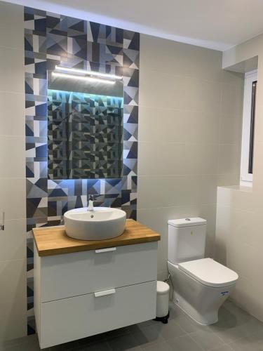Foto del baño de Bierzo Habita Apartments
