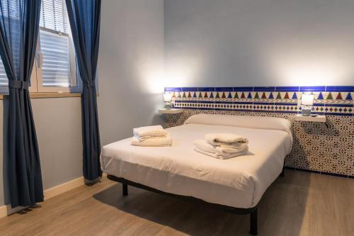 Foto de una habitación de Apartamentos Doña Concha