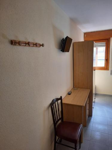 Foto de una habitación de HABITACIONES PENSION EL PARQUE