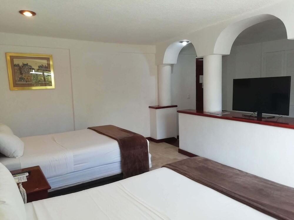 Foto de una habitación de Hotel Suites Costa Cancun