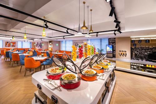 Foto de restauración de Hotel Ausotel Smart Zhujiang Newtown Guangzhou