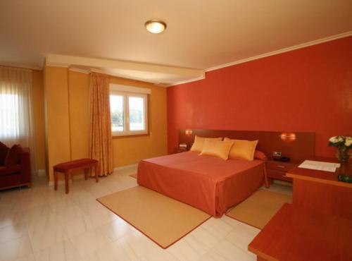 Foto de una habitación de Hotel Dinajan