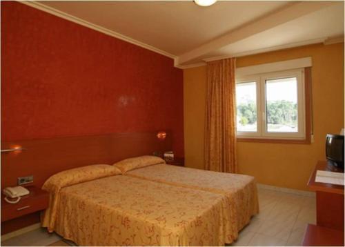 Foto de una habitación de Hotel Dinajan