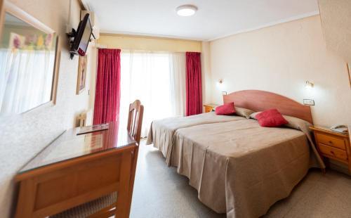 Foto de una habitación de Hotel Quino