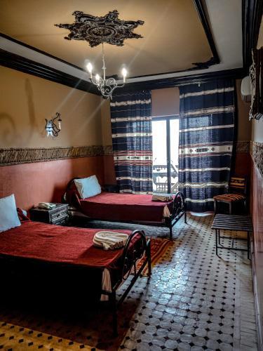 Foto de una habitación de Hotel La Kasbah
