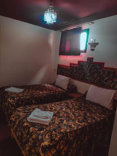 Foto de una habitación de Hotel La Kasbah