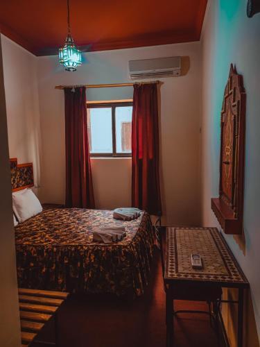 Foto de una habitación de Hotel La Kasbah