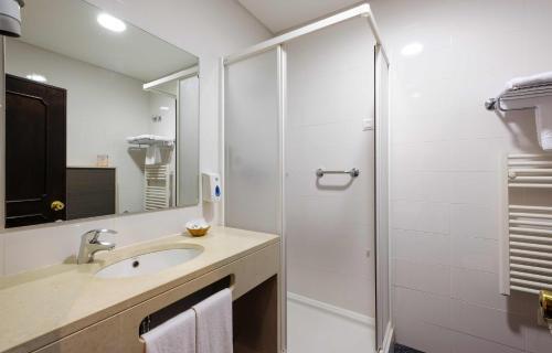 Foto de una habitación de Catolica Hotel