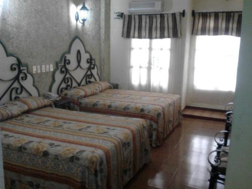 Foto de una habitación de Hotel Coranda