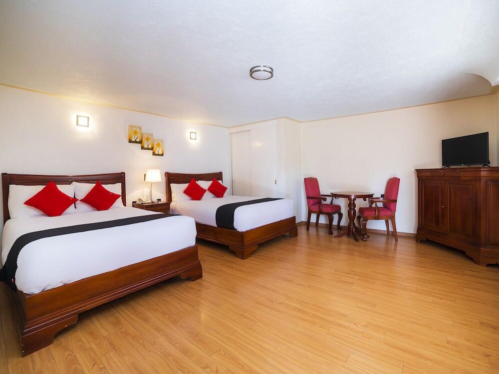 Foto de una habitación de Hotel La Mansion del Quijote