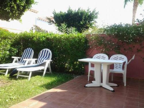 Foto de una habitación de Apartamentos Urbanización Naturista Torremar Natura