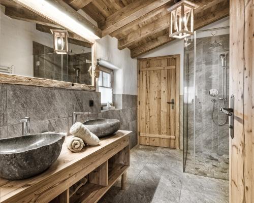 Foto del bagno Case e chalet Hüttendorf Ladizium