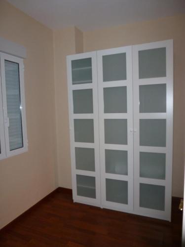 Foto de una habitación de Apartamentos Turia