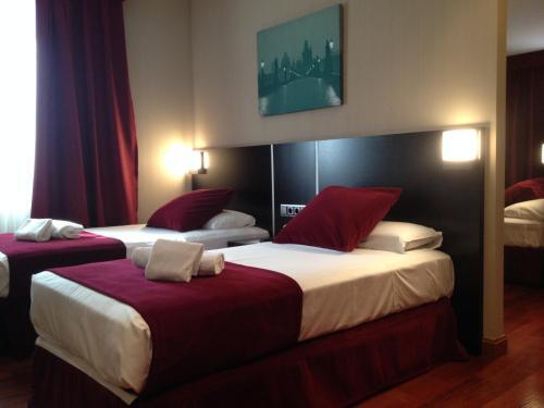 Foto de una habitación de Hotel Clement Barajas