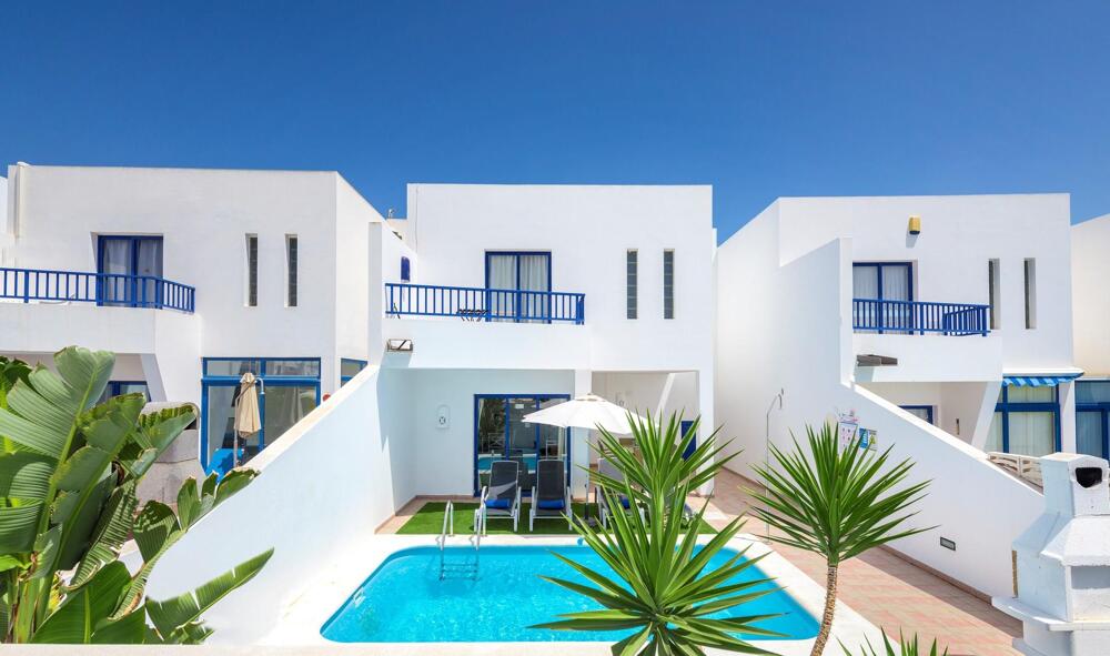 Foto de una habitación de Villas Puerto Rubicon