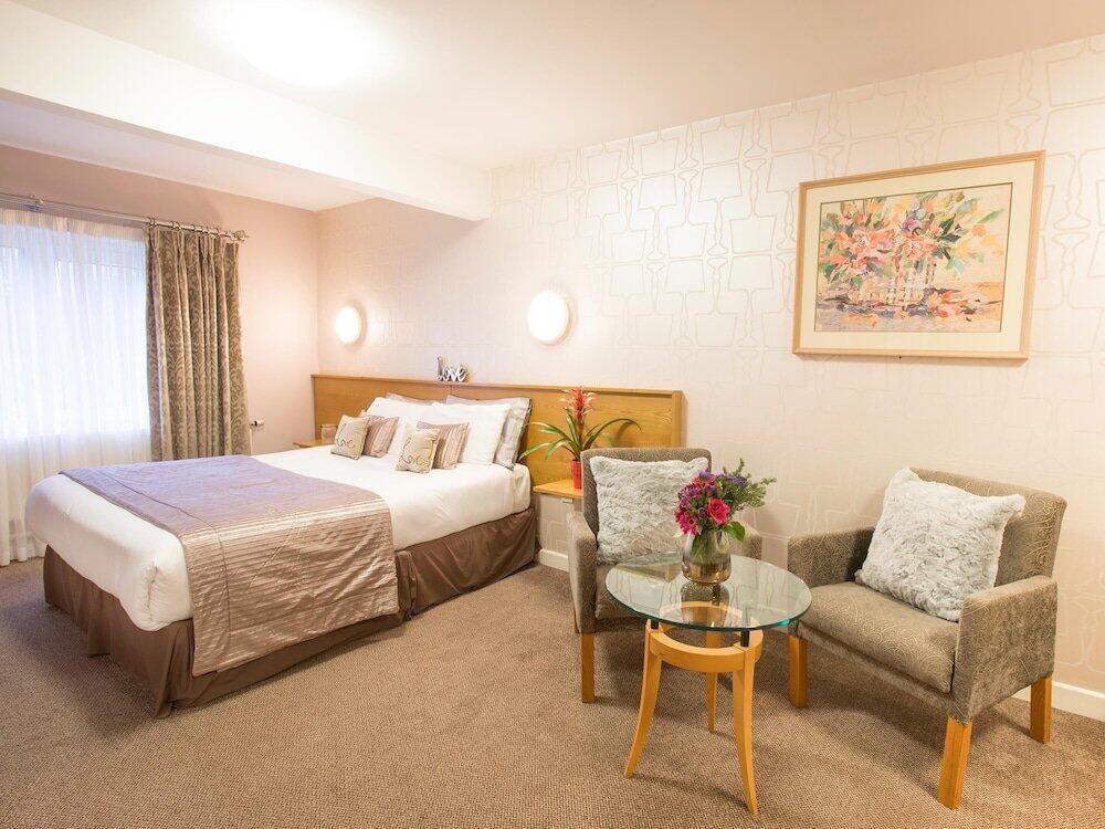 Foto de una habitación de Hotel The Commons Express Inn 