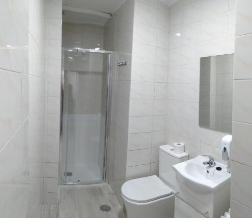 Foto de una habitación de Hostal H Noche y Dia