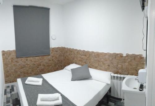 Foto de una habitación de Hostal H Noche y Dia