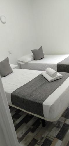 Foto de una habitación de Hostal H Noche y Dia