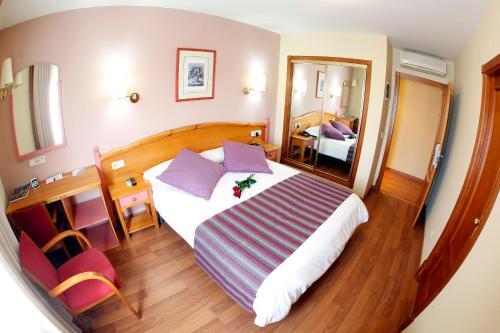 Foto de una habitación de Hotel Maria de Luna