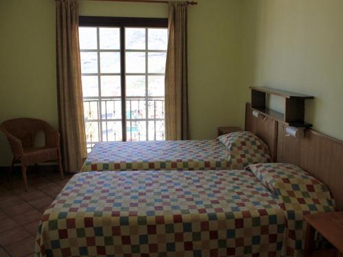 Foto de una habitación de Apartamentos Atlantis