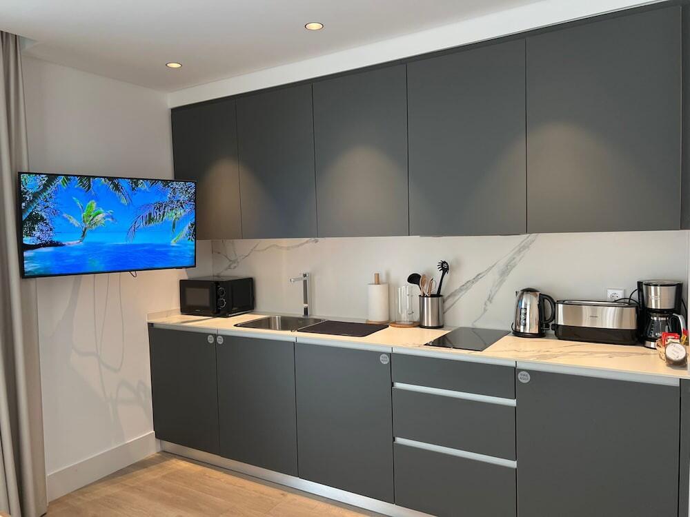 Foto de una habitación de Apartamentos Turísticos La Plaza