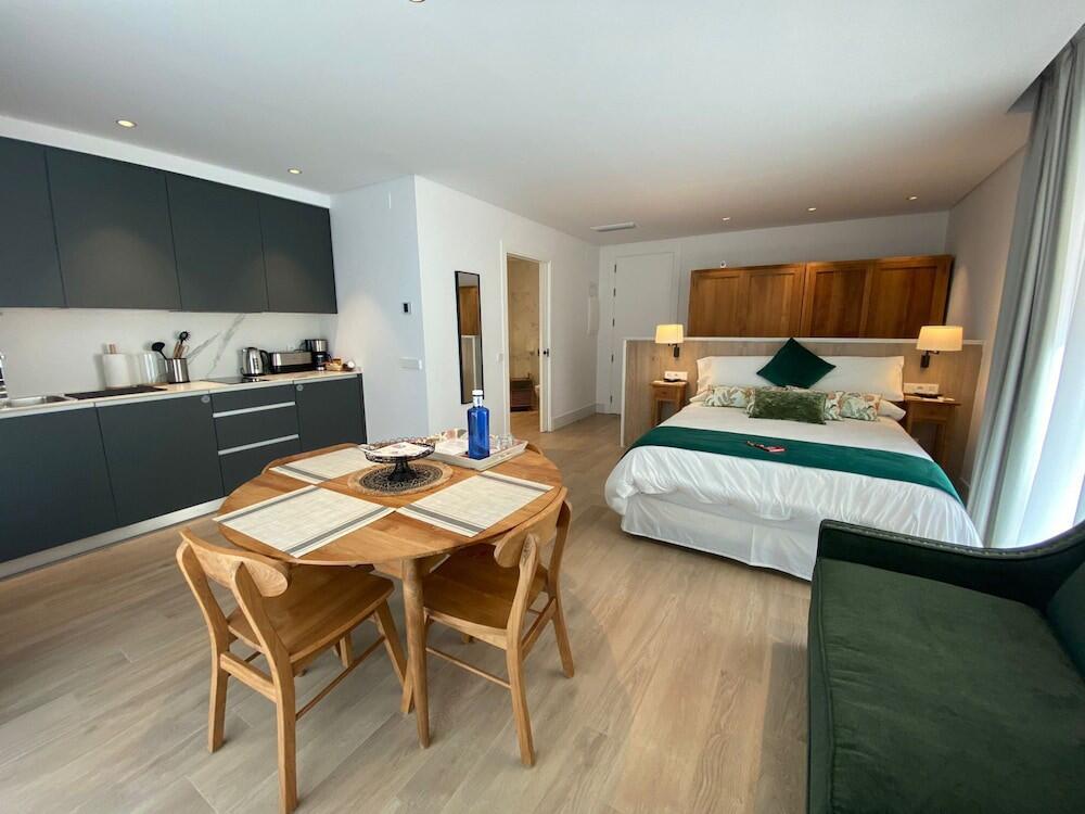 Foto de una habitación de Apartamentos Turísticos La Plaza