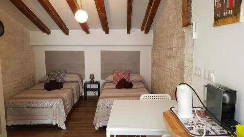 Foto de una habitación de Hostal PLAZA REDONDA brugada home